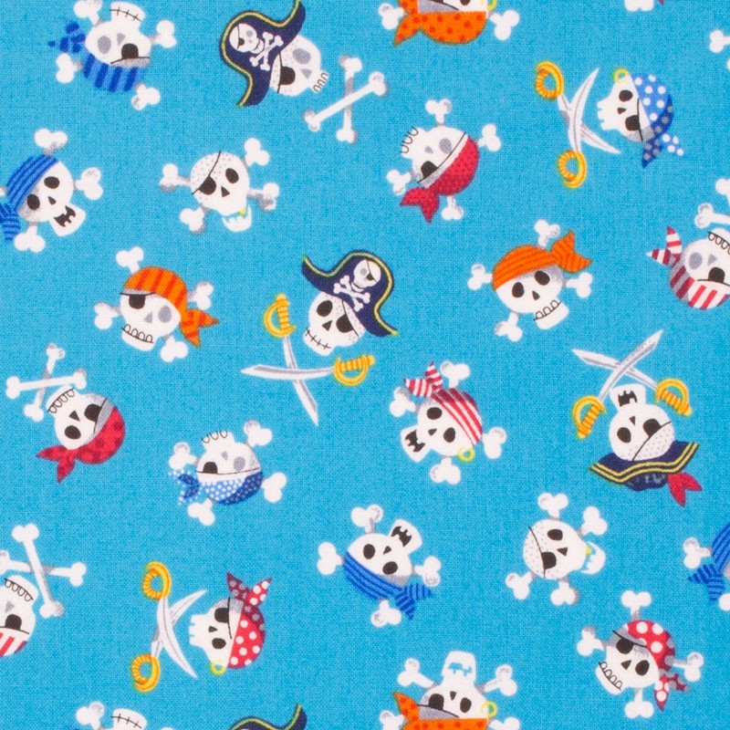 TELA CALAVERAS PIRATAS FONDO AZUL